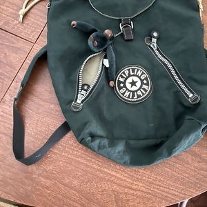 Kipling back pack with draw string closure. Vintage. Dark green.